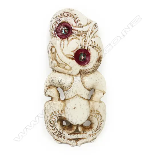 A Māori carved whalebone hei tiki,